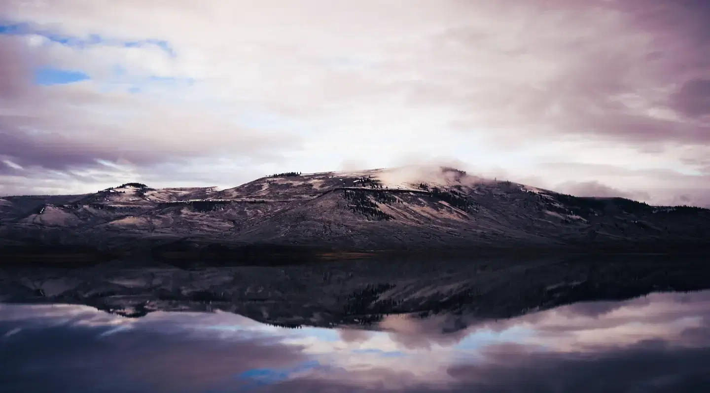 Clouds above peaks and Blue Mesa Reservoir